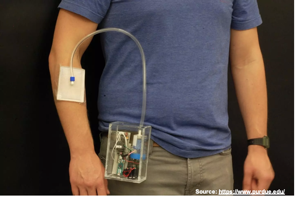 Wearable and flexible ozone generating system for treatment of infected dermal wounds