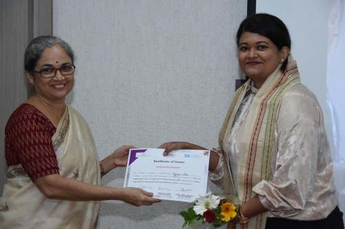Ms. Ujjayni Saha with Dr. Vandana E. during the felicitation
